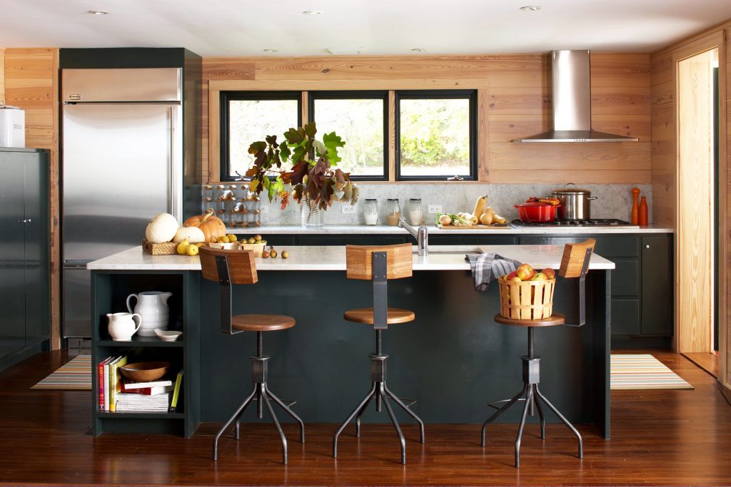 dark kitchen island with barstools